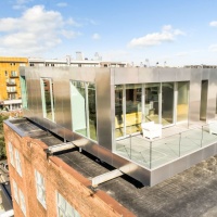 Unique Rooftop Home Takes Top SIP Building Award